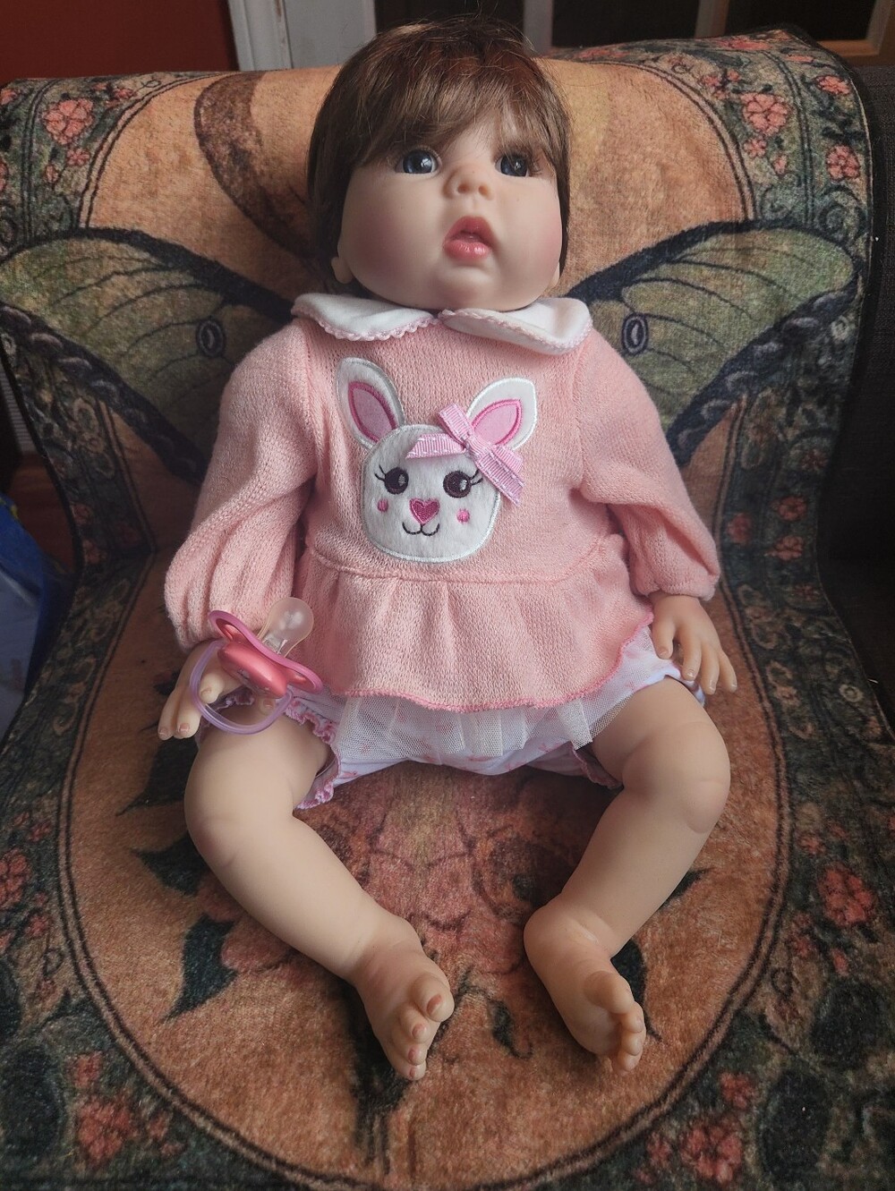 Aori Lifelike Reborn Baby Doll measuring 22 inches in length